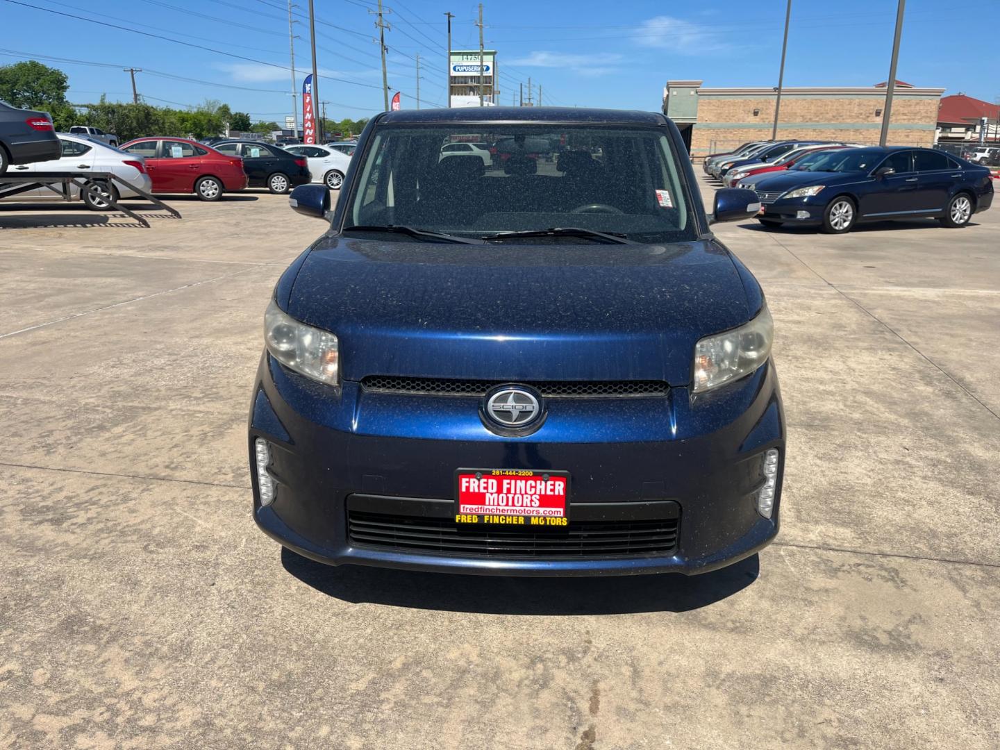 2014 blue /black Scion xB (JTLZE4FE1EJ) , Automatic transmission, located at 14700 Tomball Parkway 249, Houston, TX, 77086, (281) 444-2200, 29.928619, -95.504074 - Photo#1